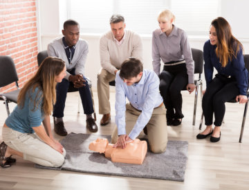 young man doing cpr training